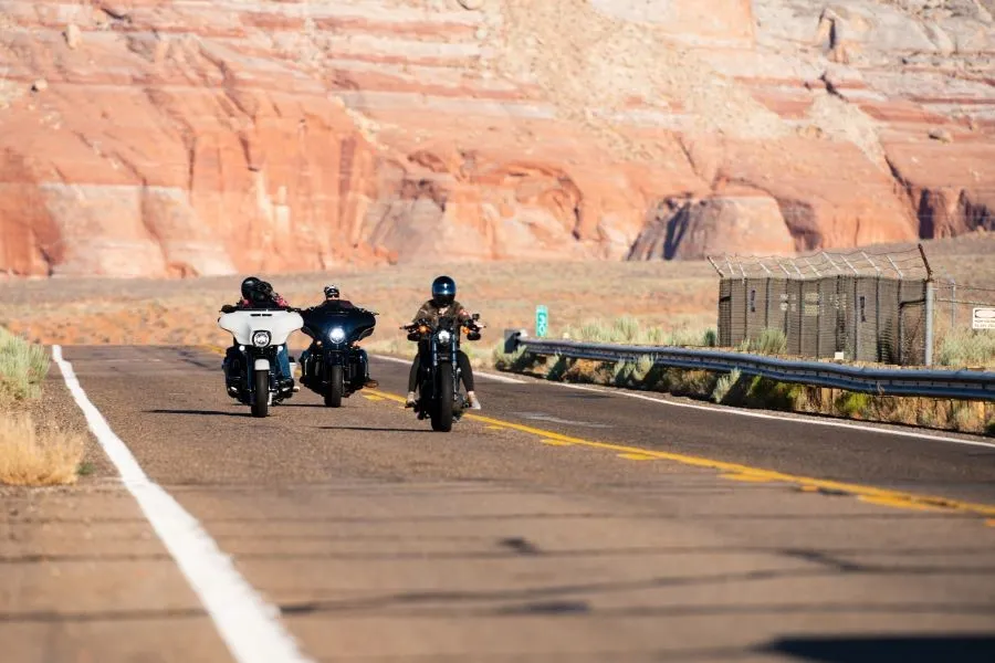 Motorbike racing on desert way